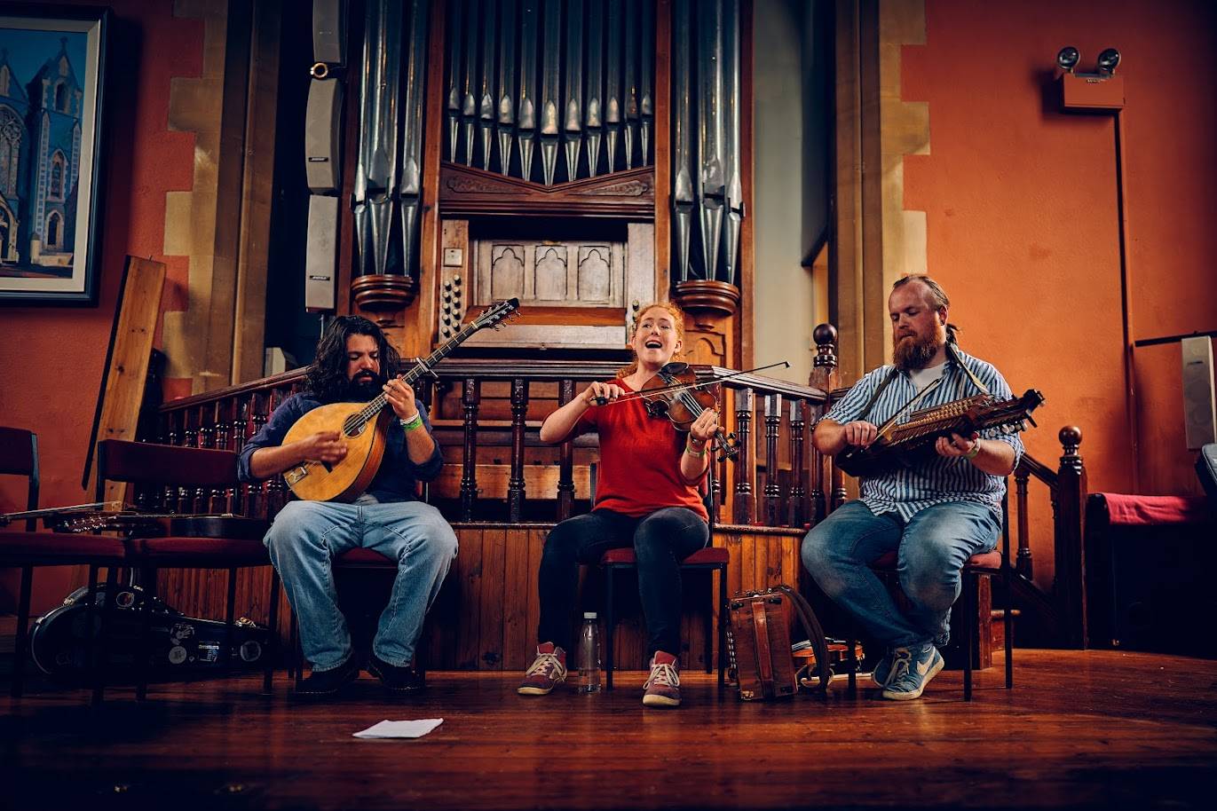 The band Sheaf perform on stage at the Cause