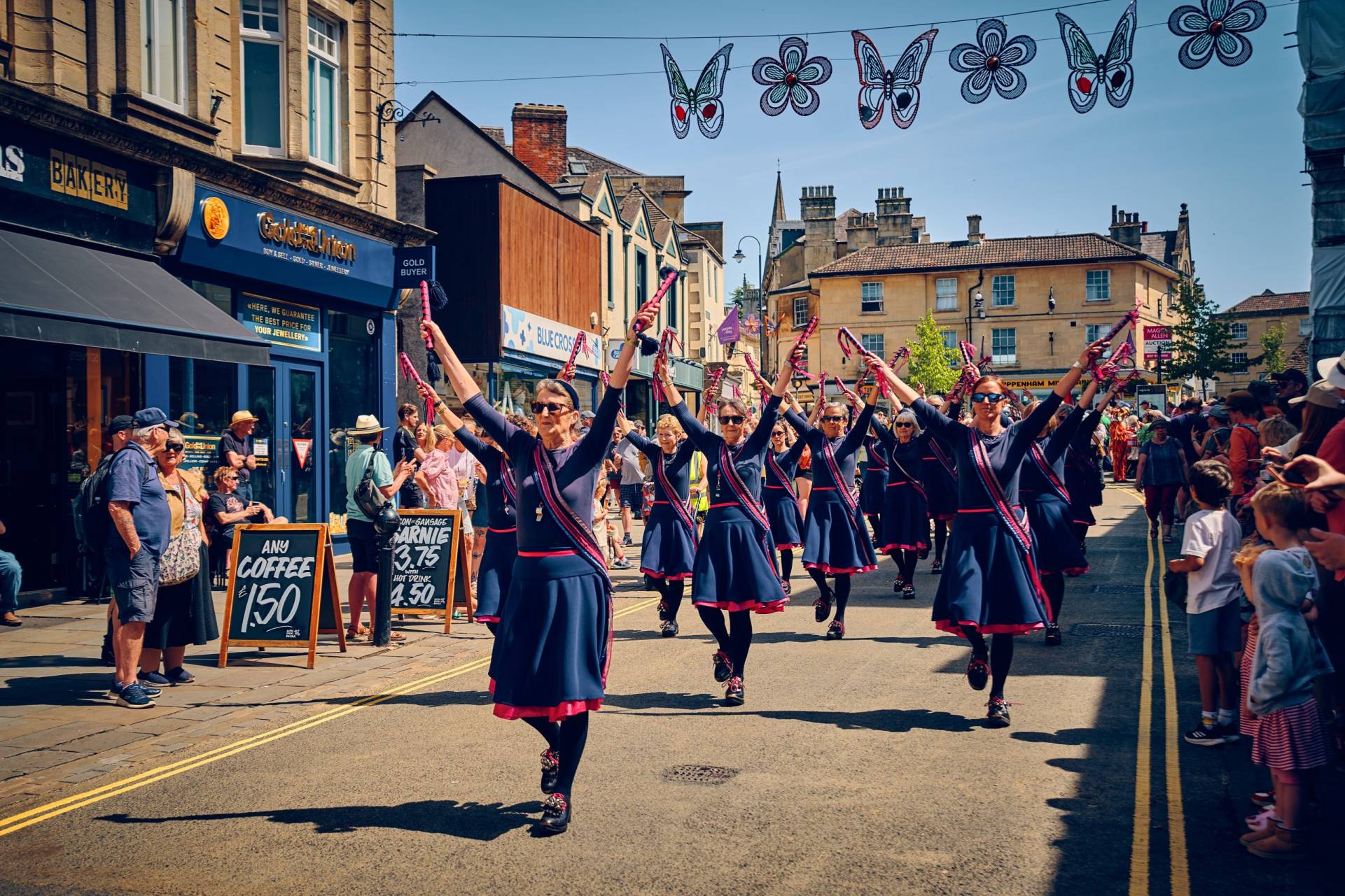 Liberty Hill Morris dancing down the High Street as part of the Festival parade